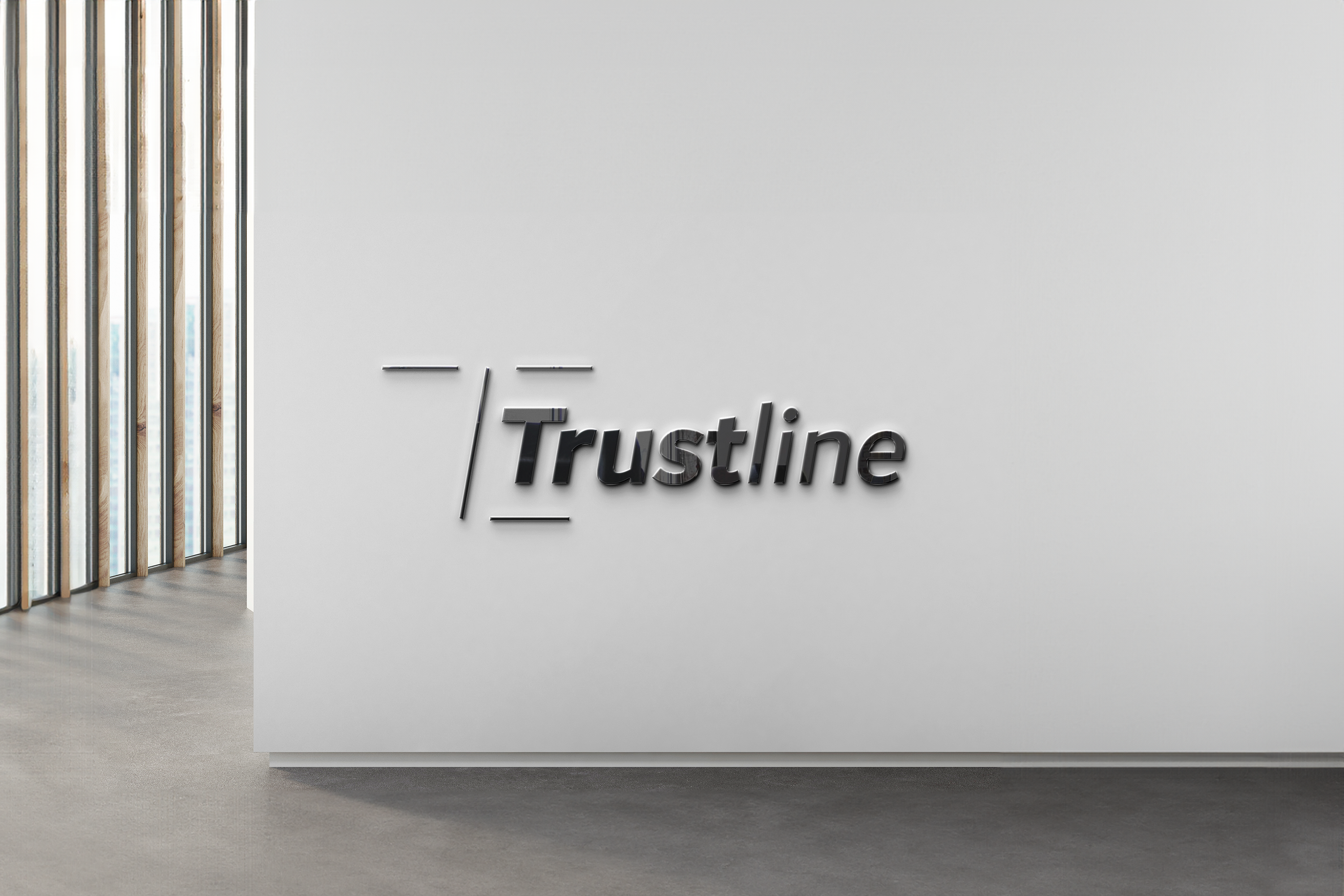 Trustline logo on a modern office wall.