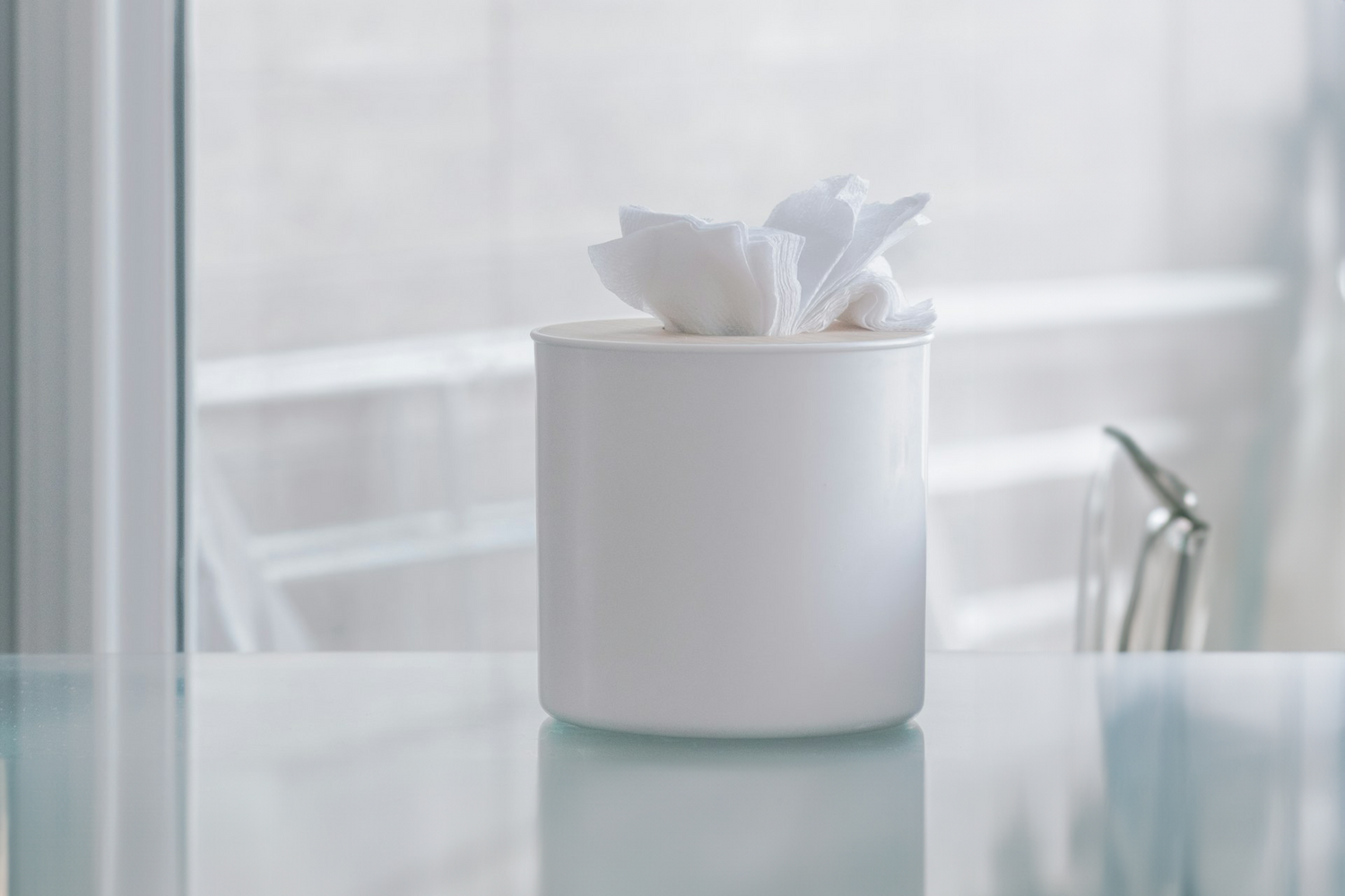 Elegant tissue holder with neatly arranged tissues, exemplifying Trustline Enterprises' premium paper products suitable for corporate and hospitality environments.